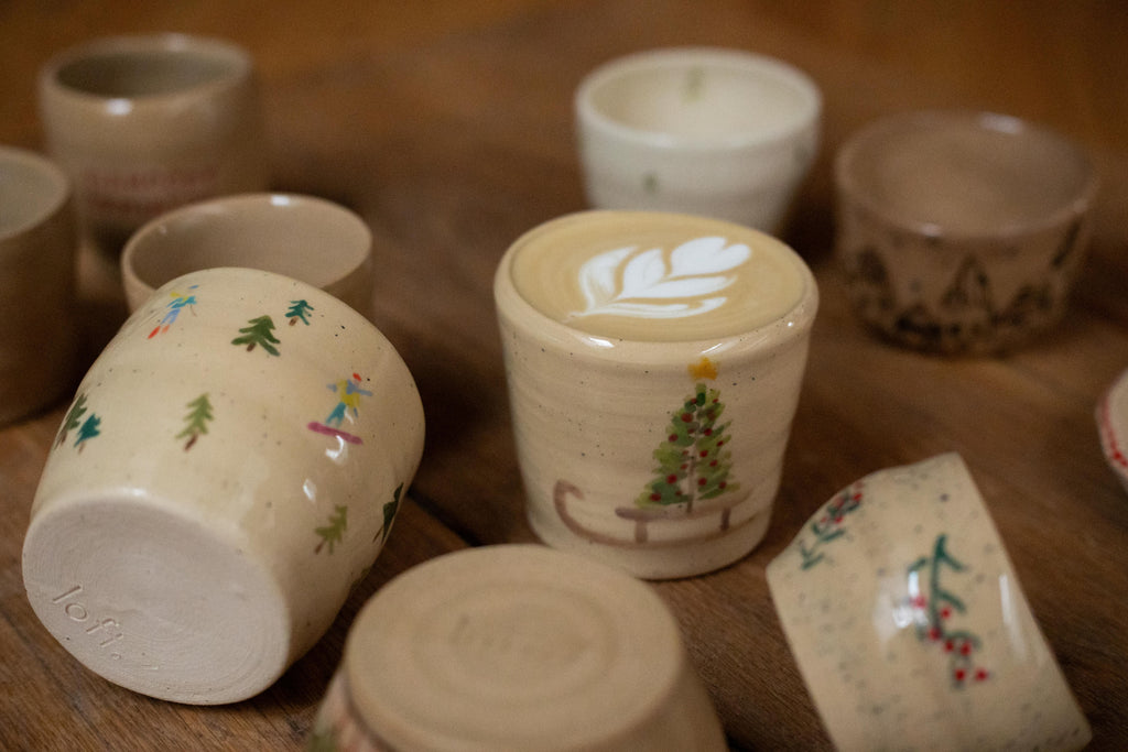 Latte cup and saucer — angle 1